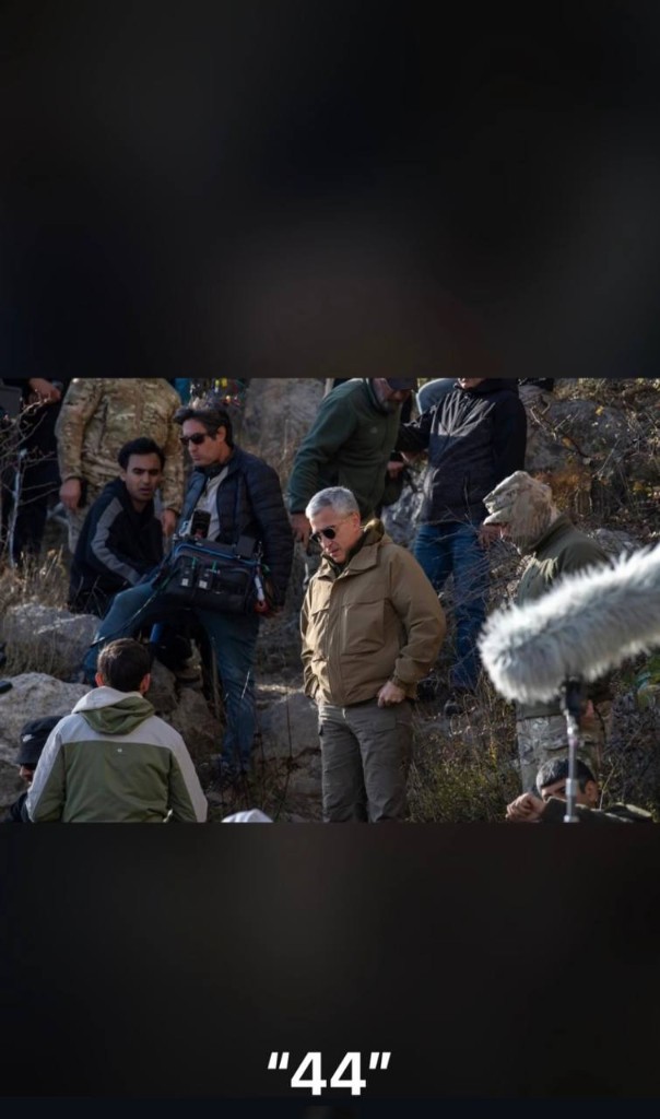 44 unit — sound mixer bag and boom on a rocky hillside location