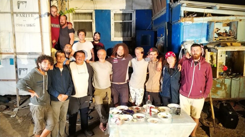 Island Within cast and crew night wrap still by the blue cabin
