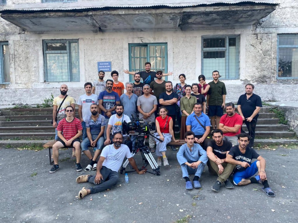 Maryam cast and crew group photo with cinema camera on tripod